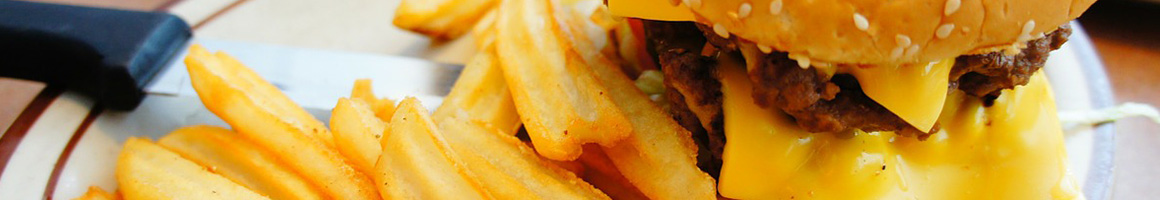 Eating Burger at Hoosier Drive-In restaurant in Huntington, IN.